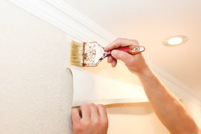 Pose de papier peint à Caëstre — revêtements muraux et toiles de verre